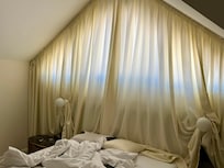 Paper thin curtains- difficult to sleep