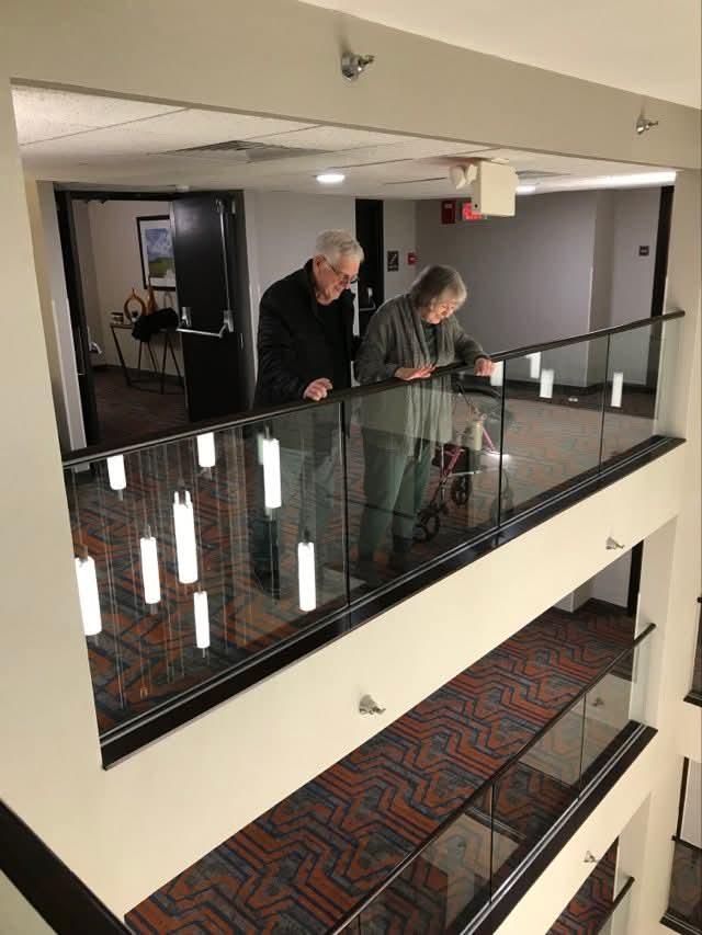 Dad and Mom looking down at us four surviving children. 