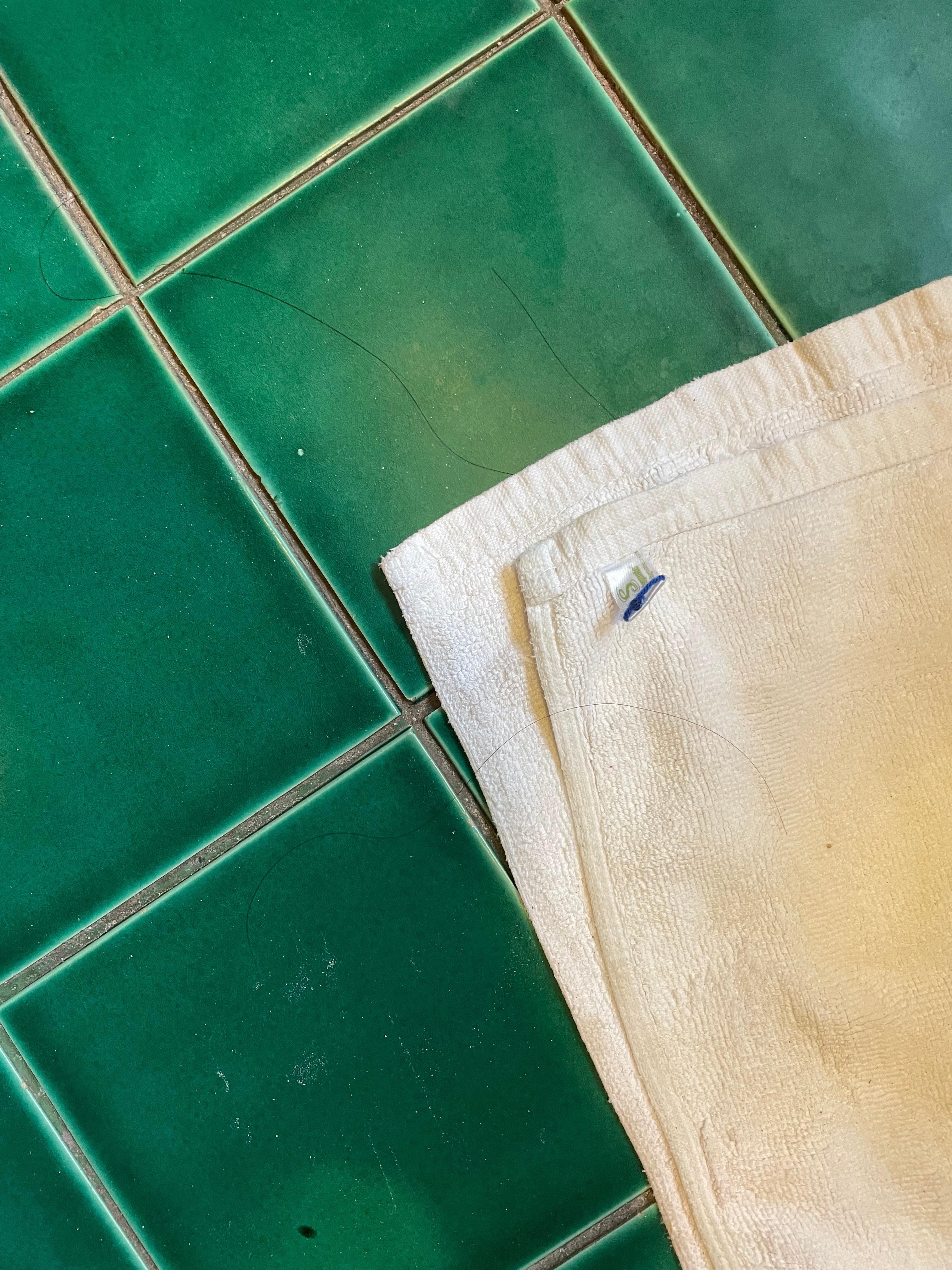 Hair on the floor and filthy bathroom. (not ours!! We are all blond)