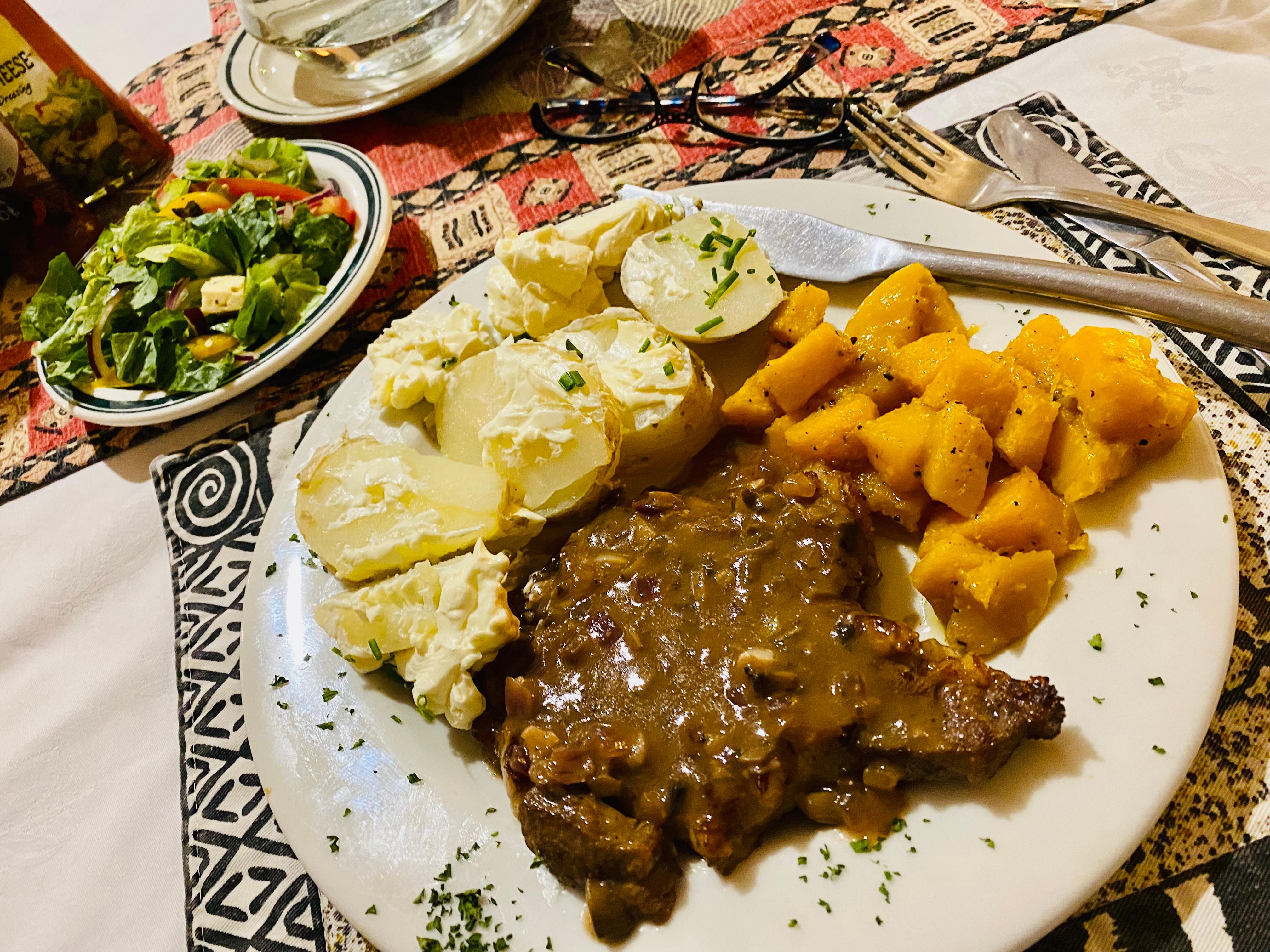 Farm raised steak, potatoes, butternut squash, and side salad