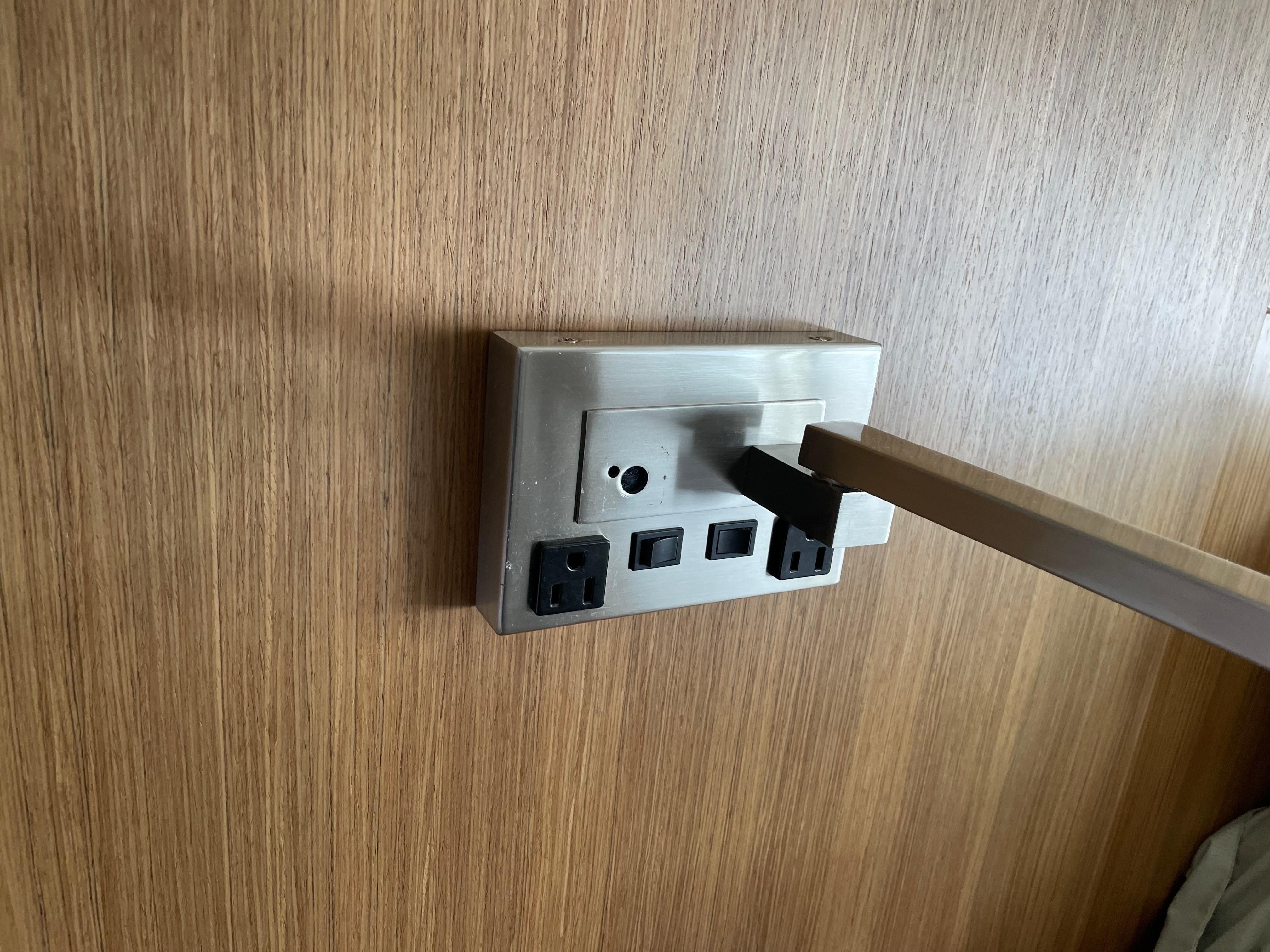 Missing lamp from one side of nightstand