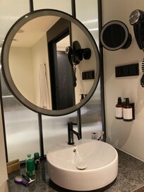 Quirky black bathroom- mirror in bathroom and bedroom