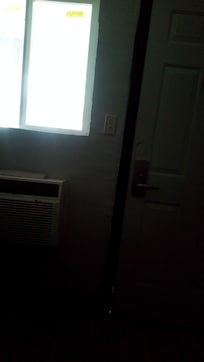 Room facing window and entrance