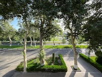 The beautiful green spaces in front of the hotel.