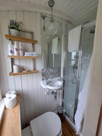 Compact bathroom but well stocked and a lovely shower!