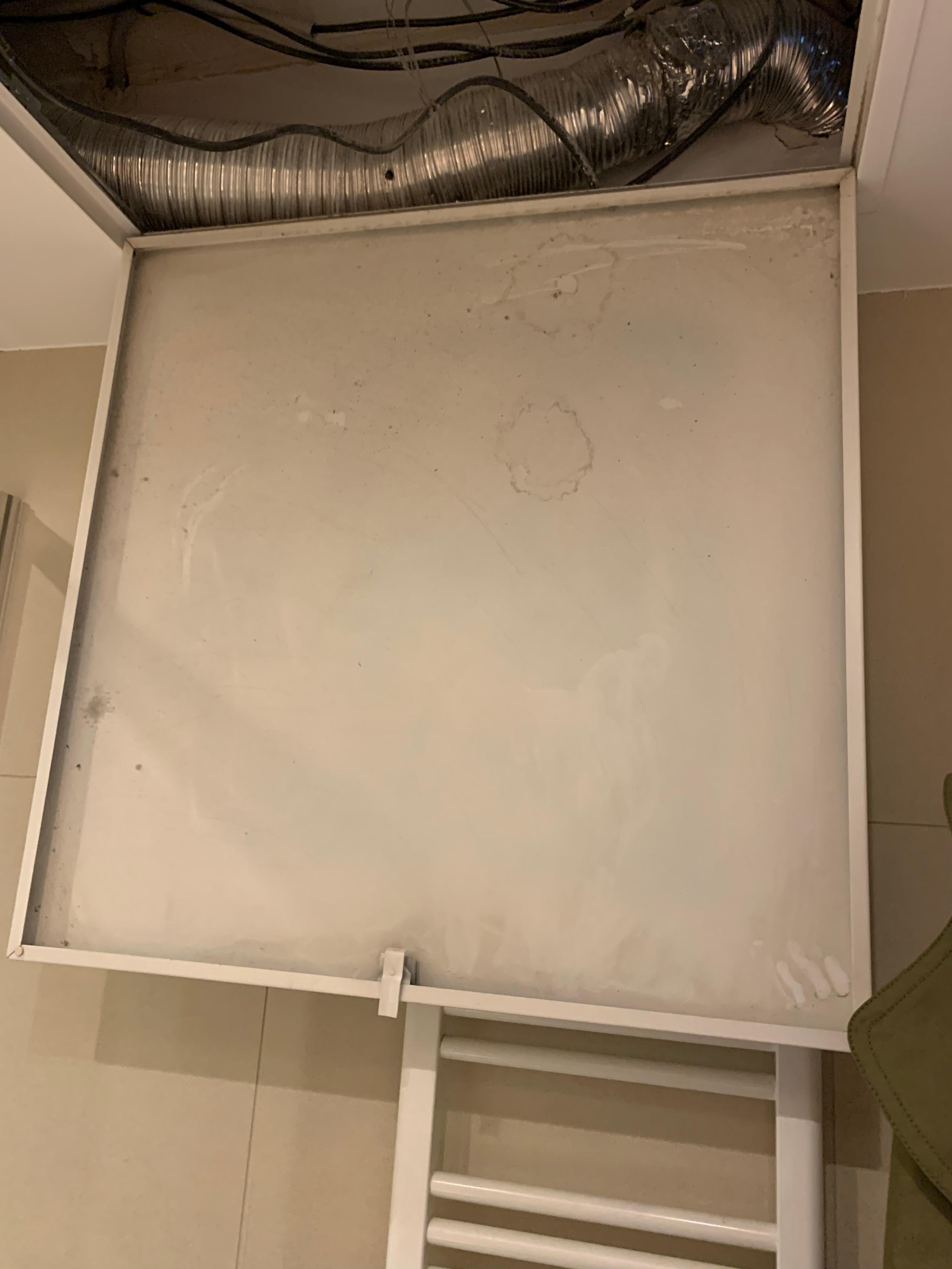 Panel fell down striking my head.