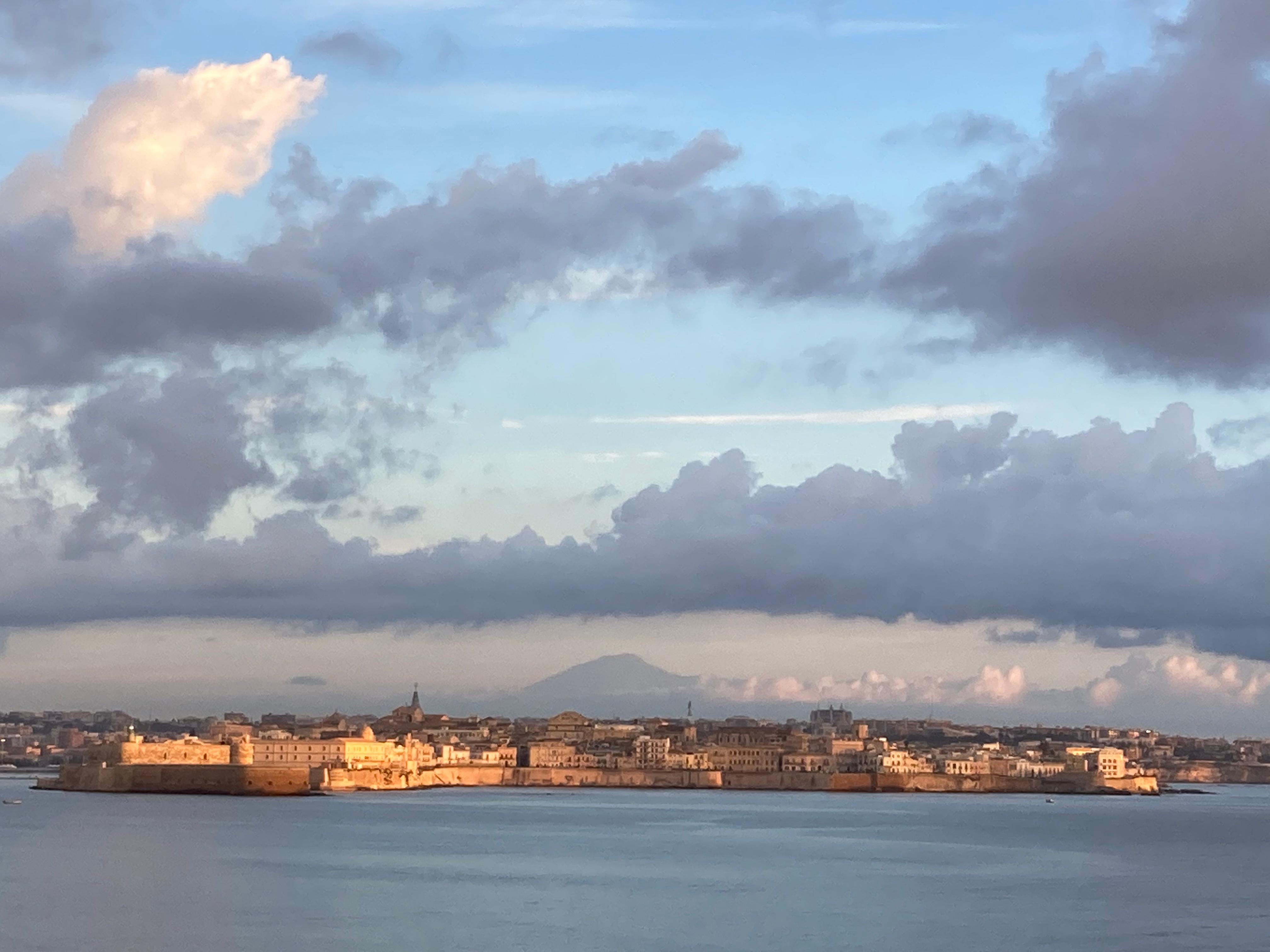 View of Ortigia and Mount Etna from our room and terrace.