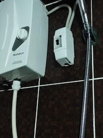 Electrical power switch next to shower?!? Unbelievable!