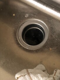 Very slow water drain in kitchen sink (broken disposer)