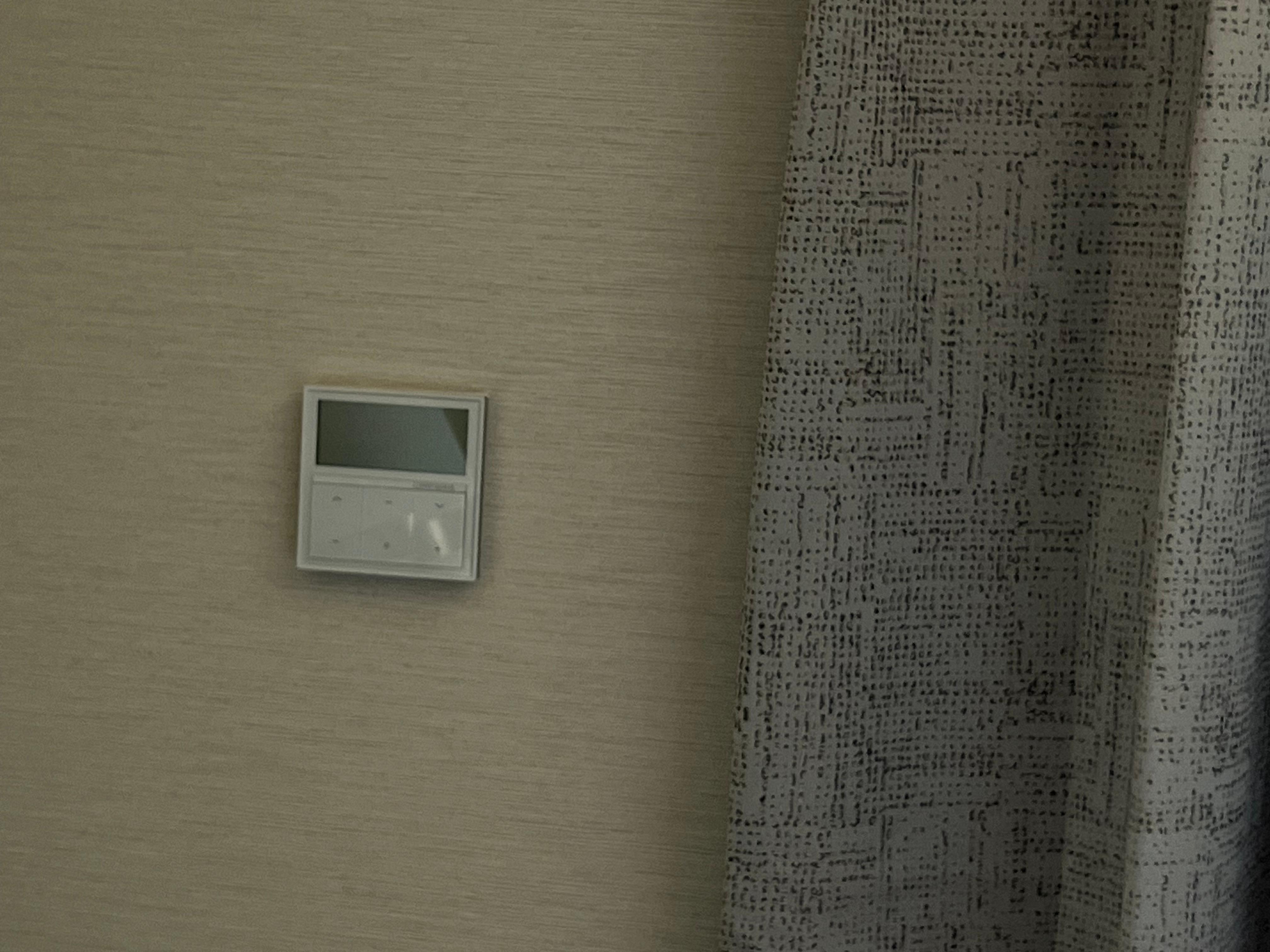 Blinds are by remote control on the wall