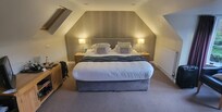 Our charming top floor cozy room - with tea and snacks!