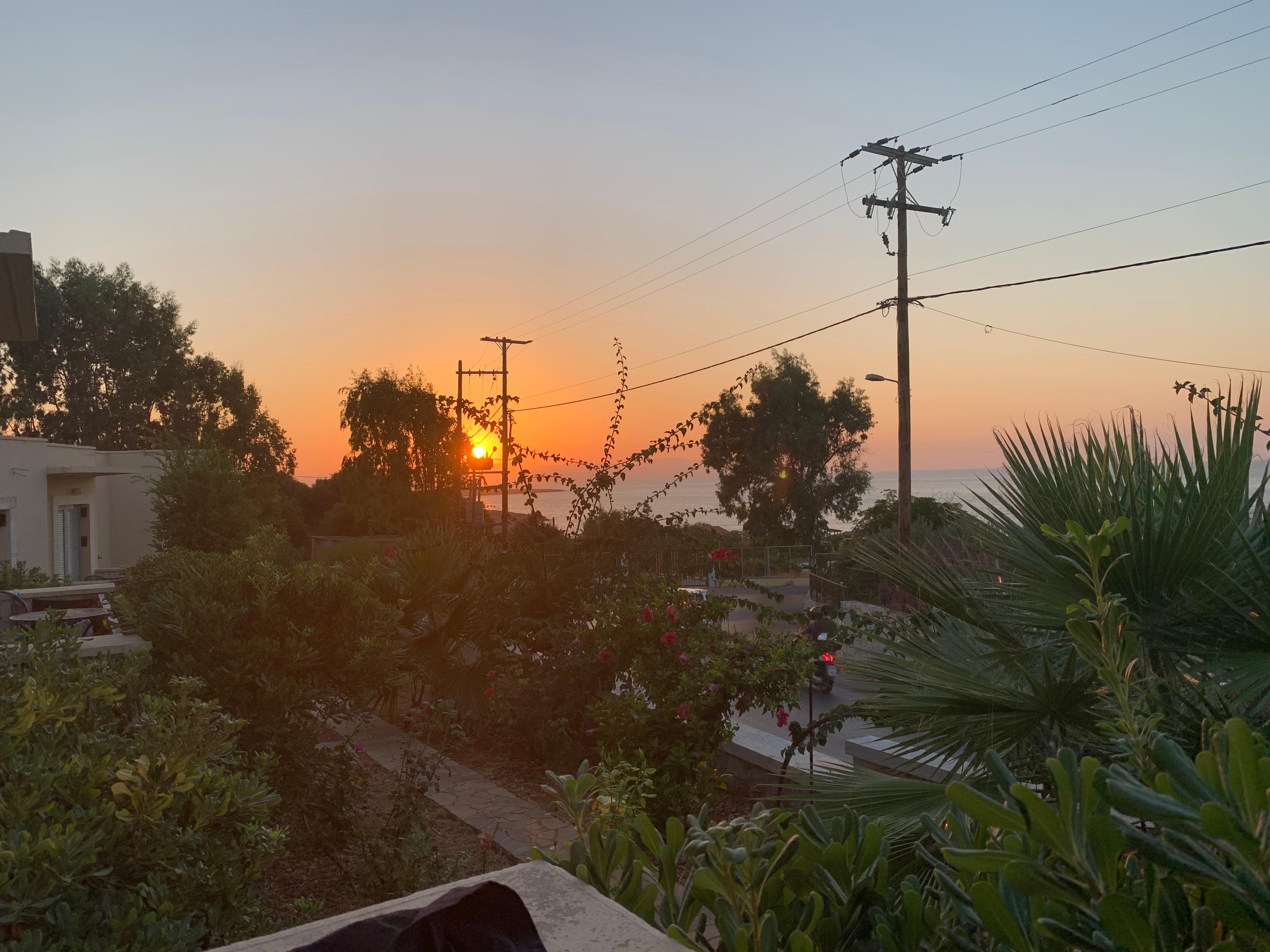 Bungalow balcony sunset view.