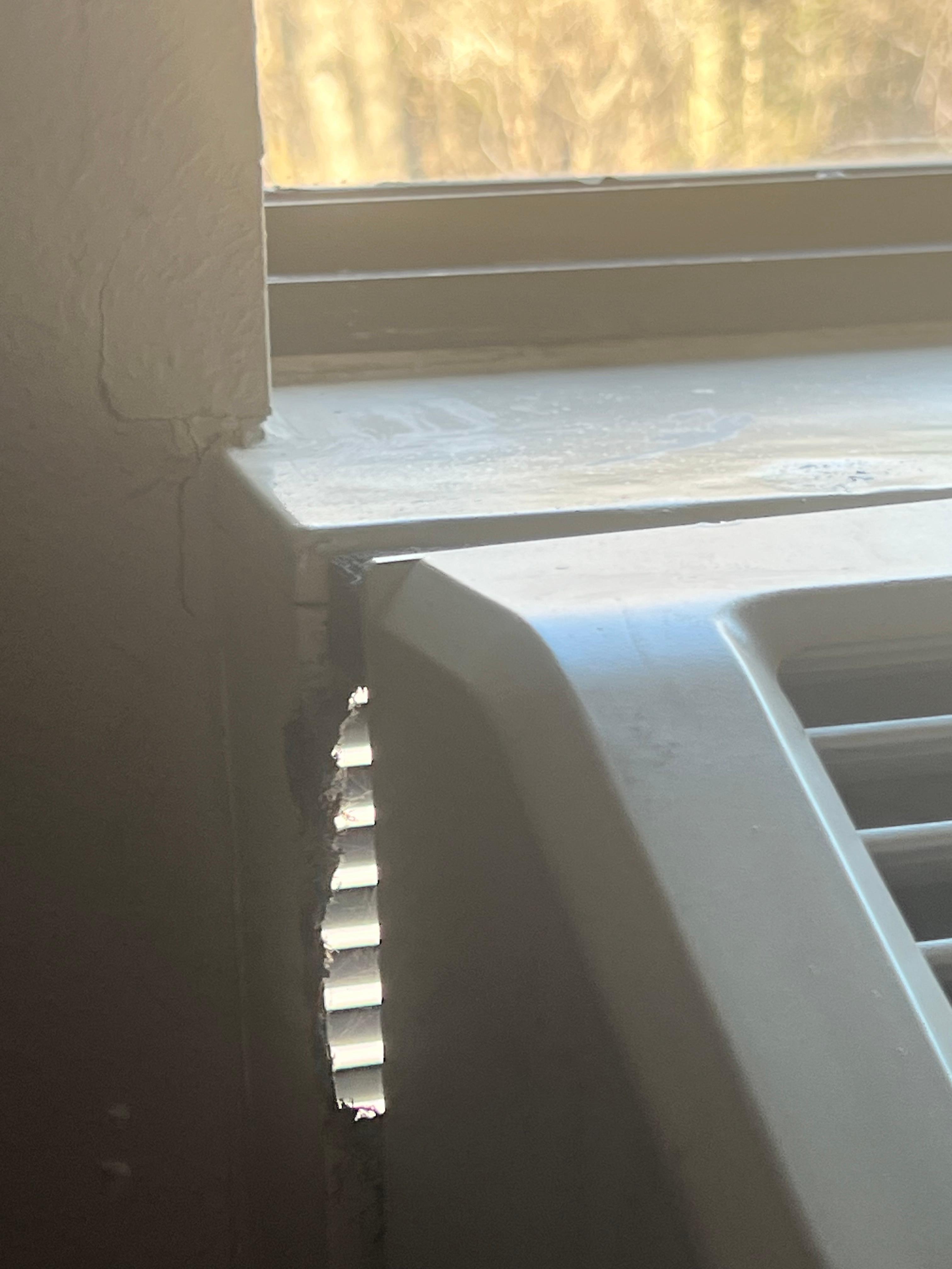 Hole to outside through AC; room became cold quickly after shutting off heat