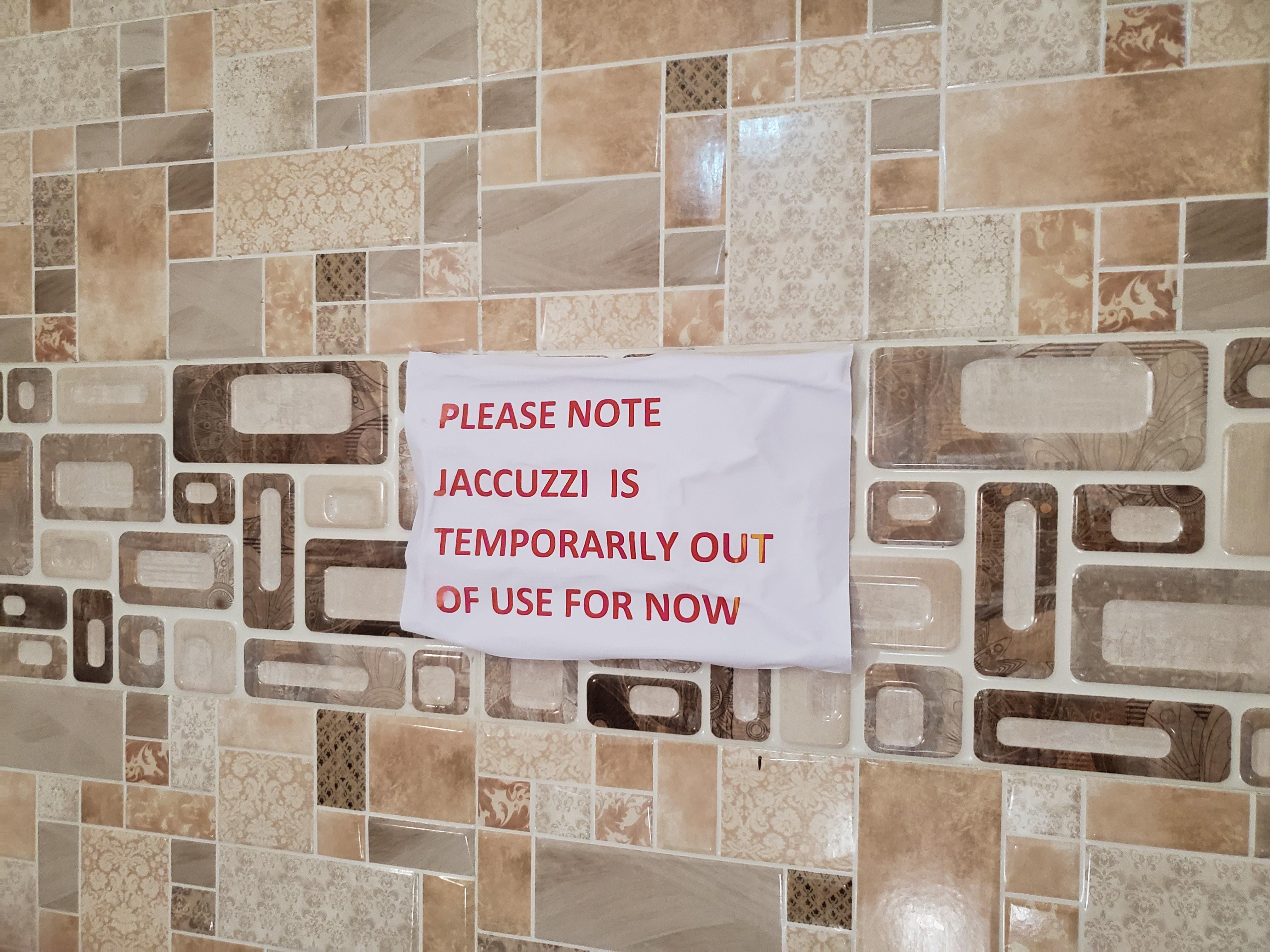 Sign above the jacuzzi