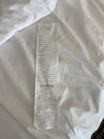 Gammel kvittering under den ene seng