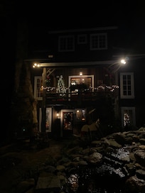 Front entrance pictured at night.