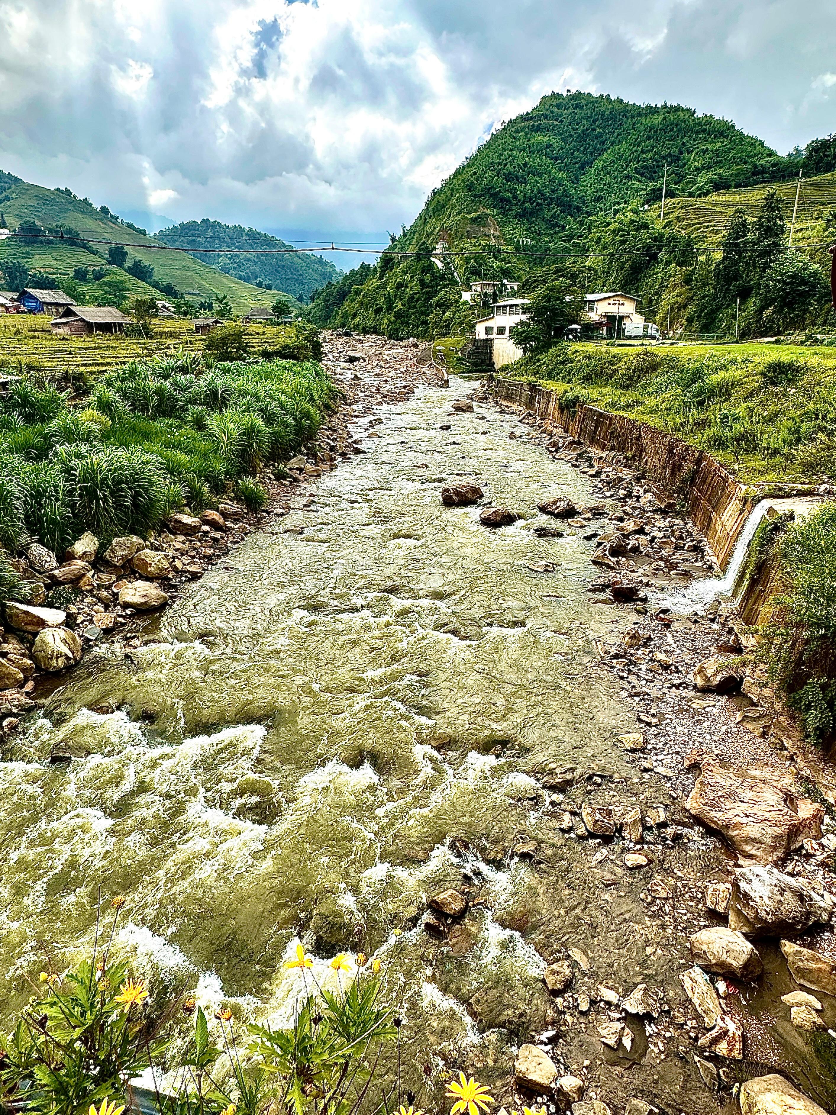 River flowing from the mountains thru my local Hmong guide's village