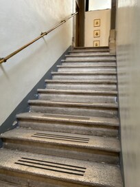 halfway up, that's near the lobby - the door to the lobby is to the right after a few more steps.