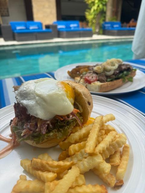 Delicious meals by the main pool. Burger and Steak sandwich very tasty!