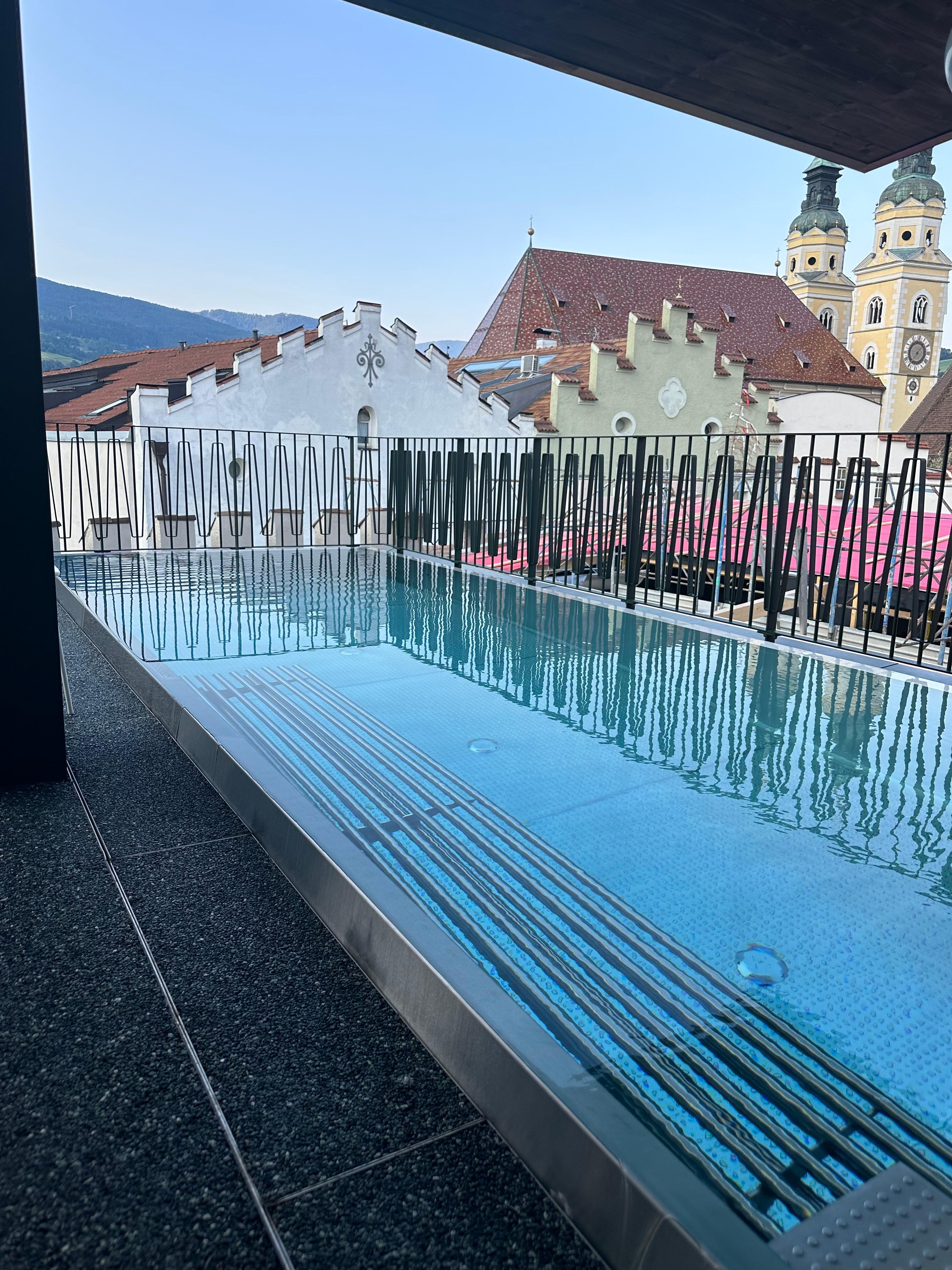 Heated rooftop pool. Large in person than in the hotel photos. 