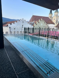 Heated rooftop pool. Large in person than in the hotel photos.
