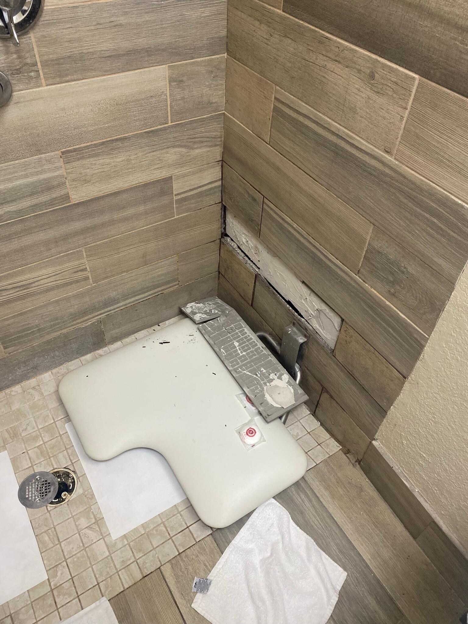 The shower chair broke after my 11 year old son sat on it