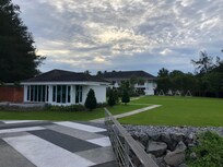 View from pool back to resort (gym room)