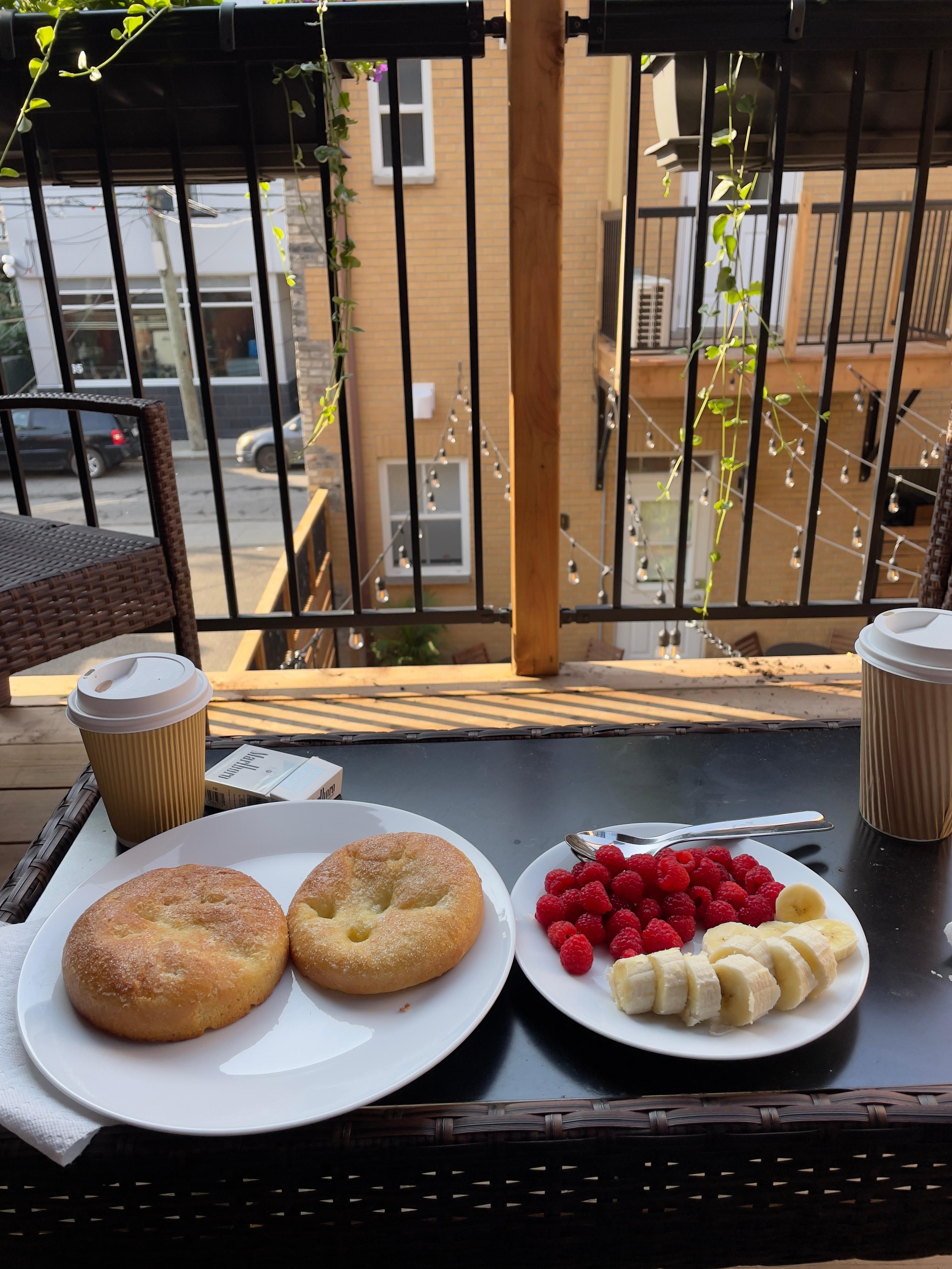 Breakfast brioche with view from balcony seats