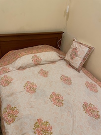 Single room, bed cover is so lovely wood block print
