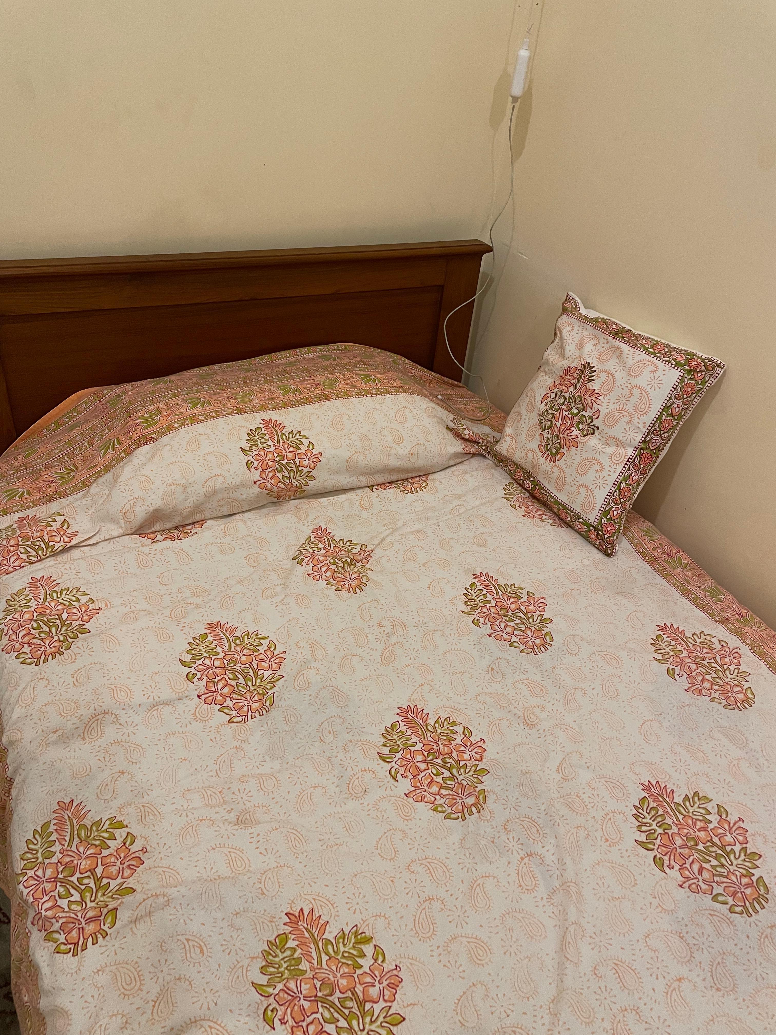 Single room, bed cover is so lovely wood block print