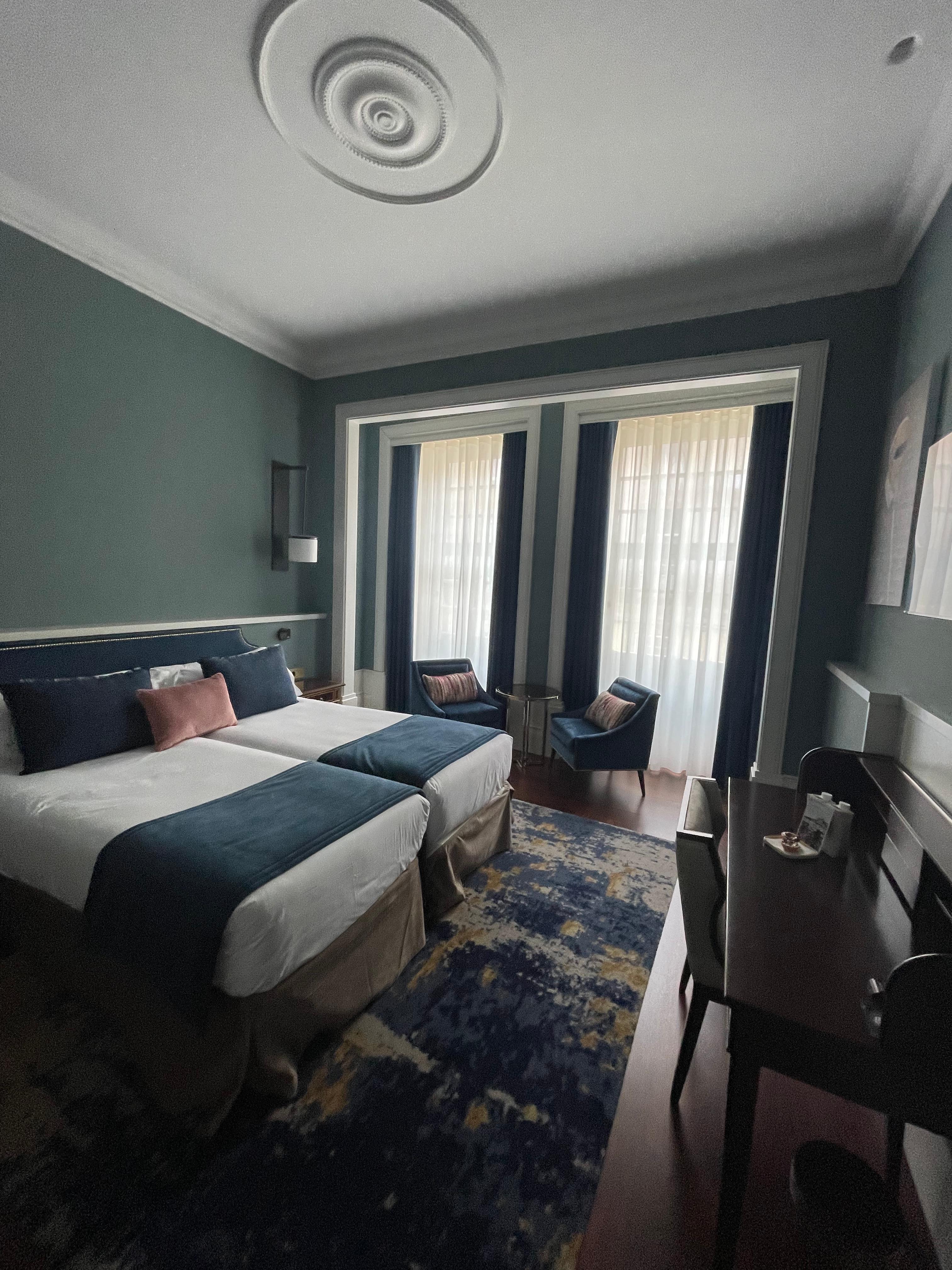 Our lovely room . Modern clean with very high ceilings.