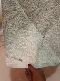 Towels with holes and stains