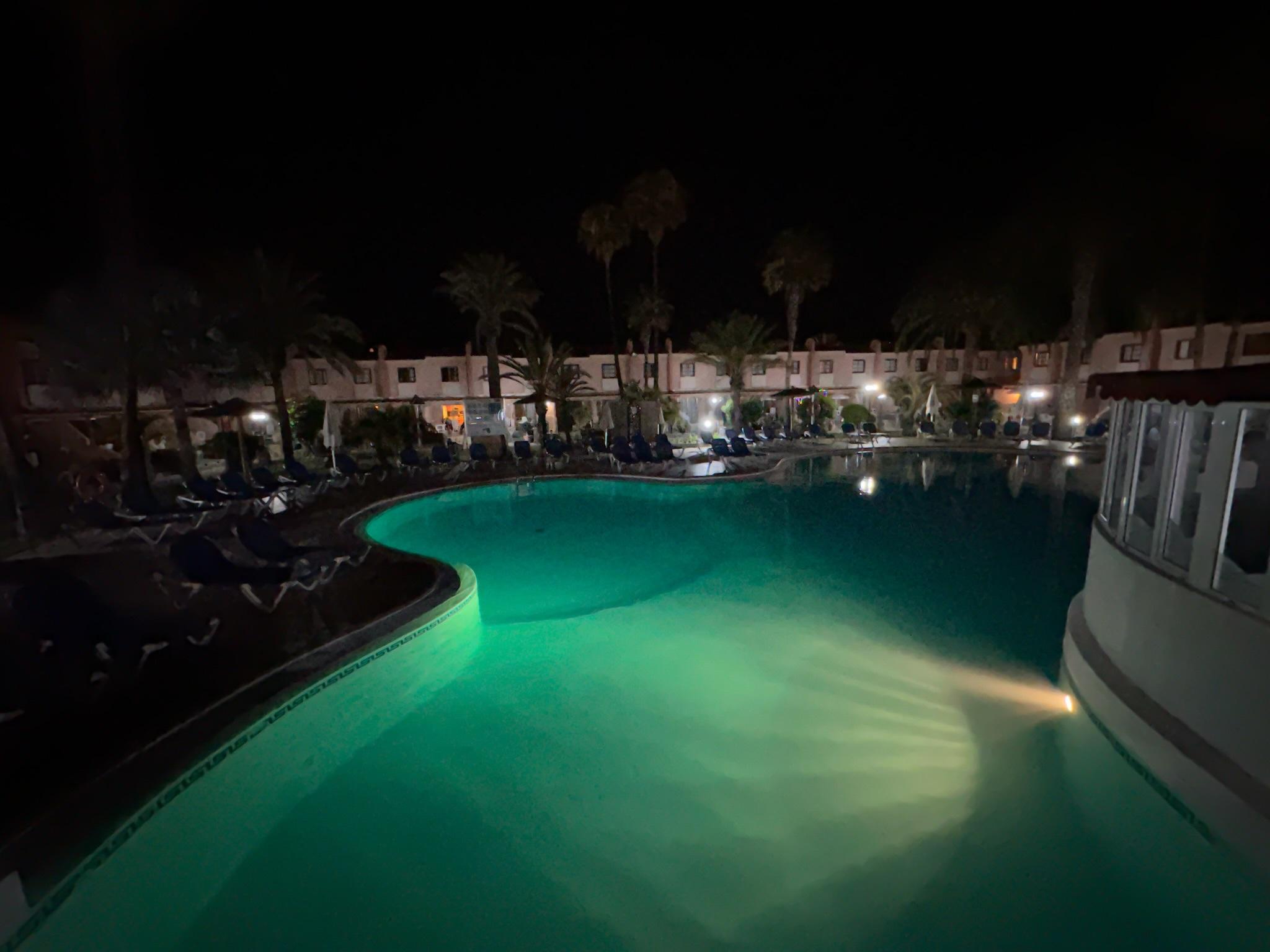 Pool area at night.