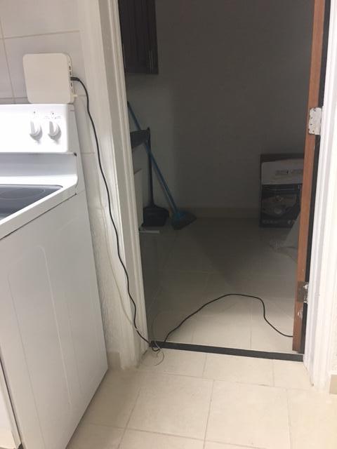 No washer dryer in empty laundry room. 