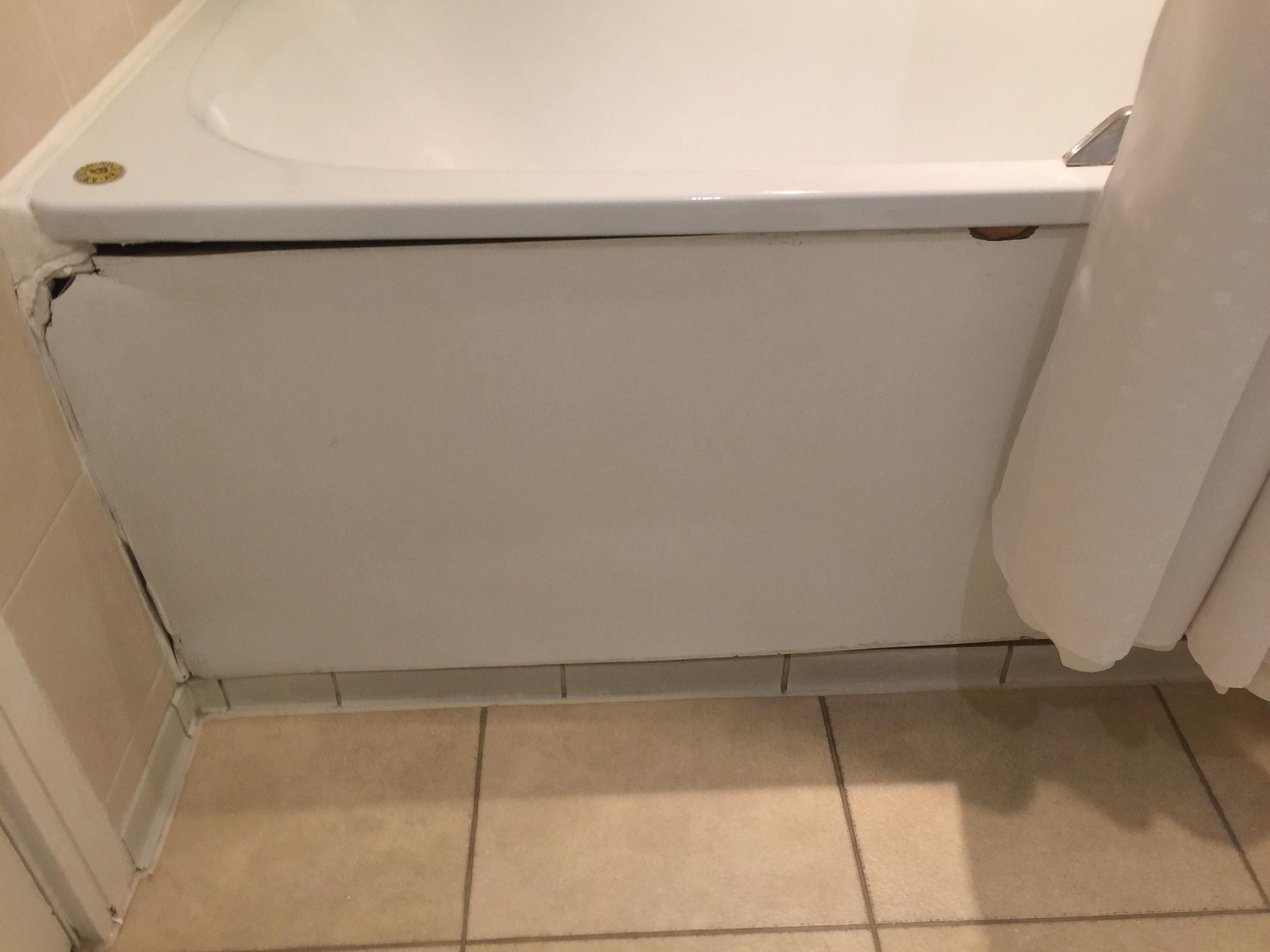 broken bathtub wall
