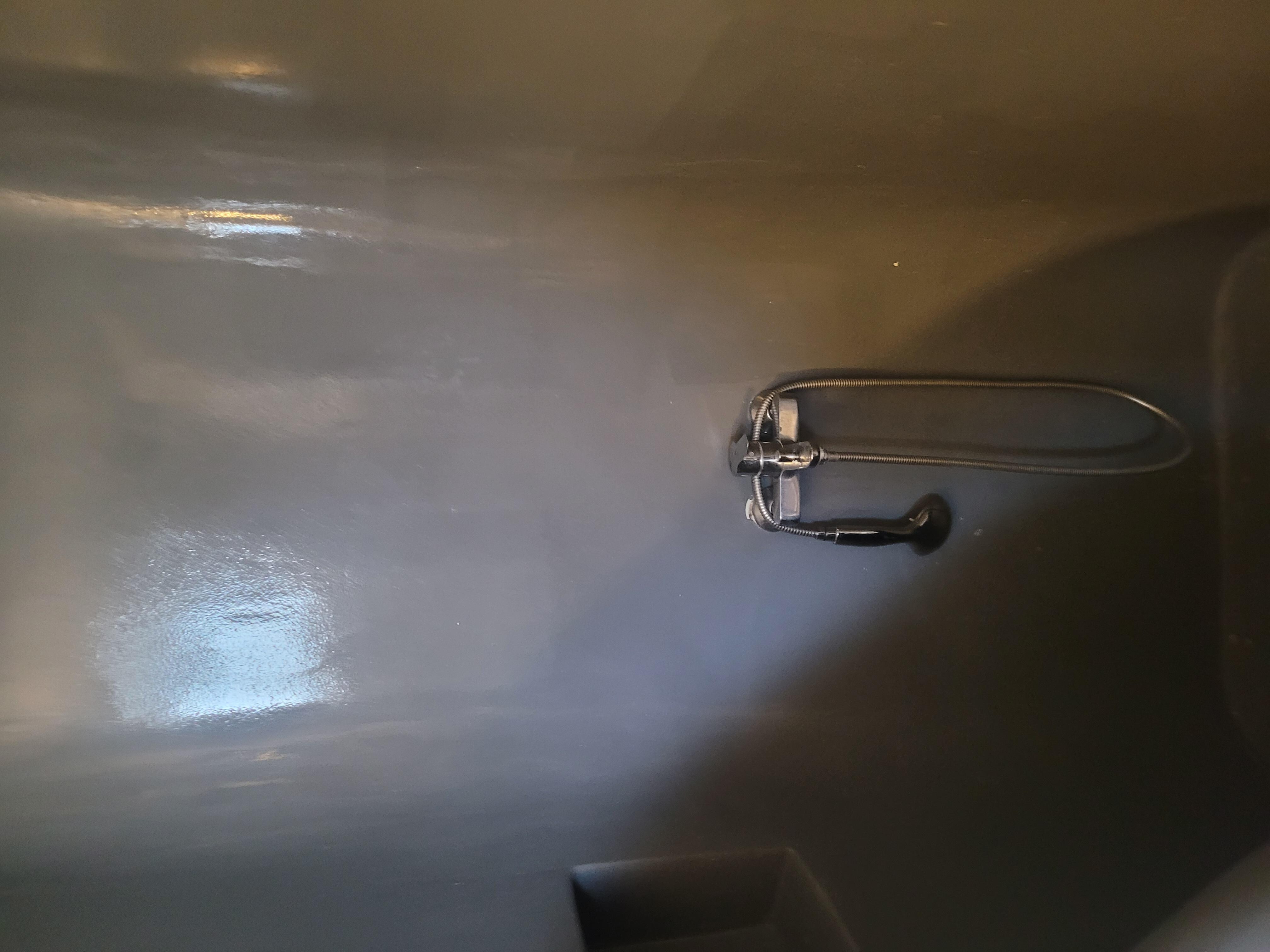 No hanging shower head.