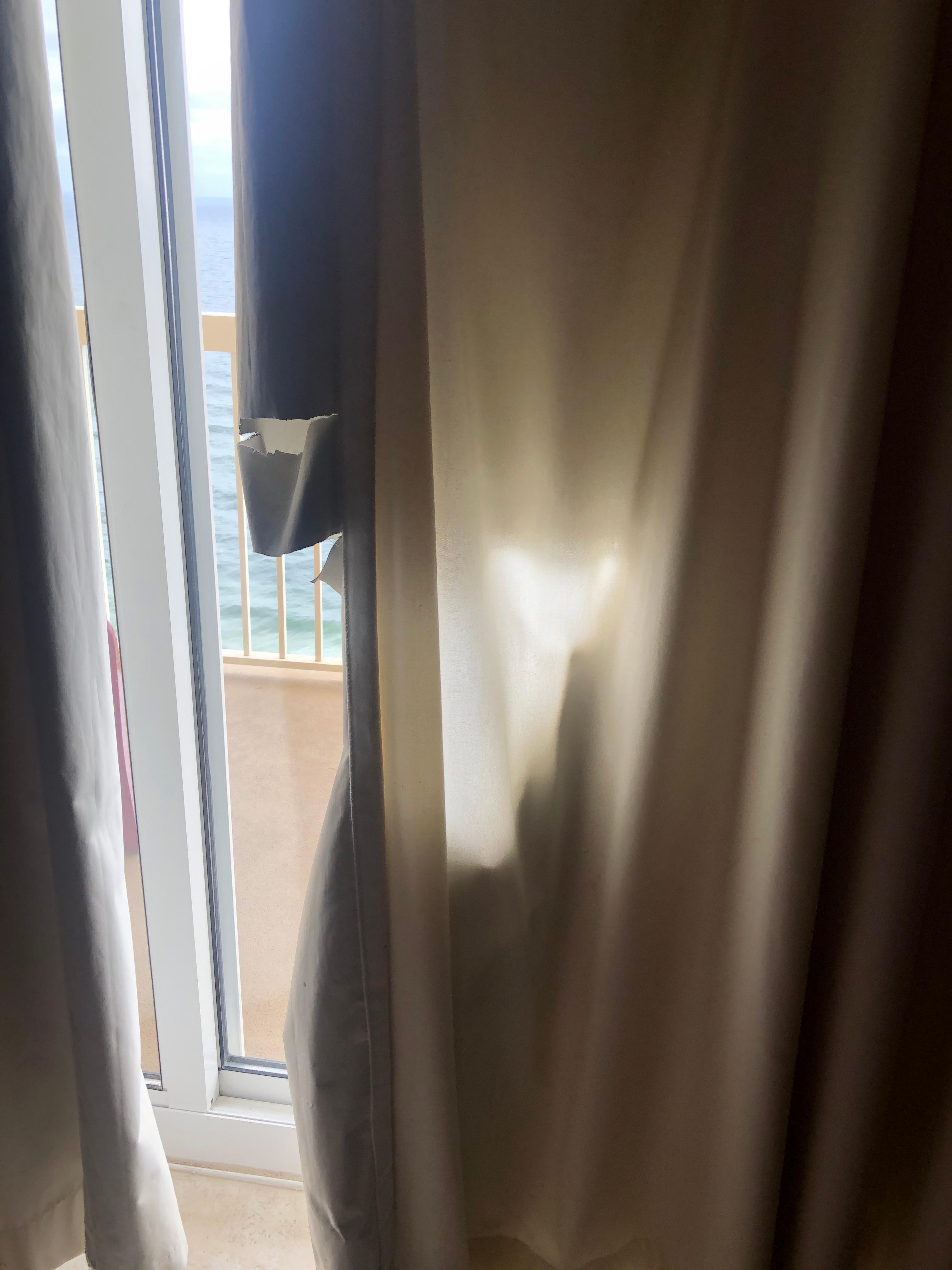 Curtains ripped in master bedroom 