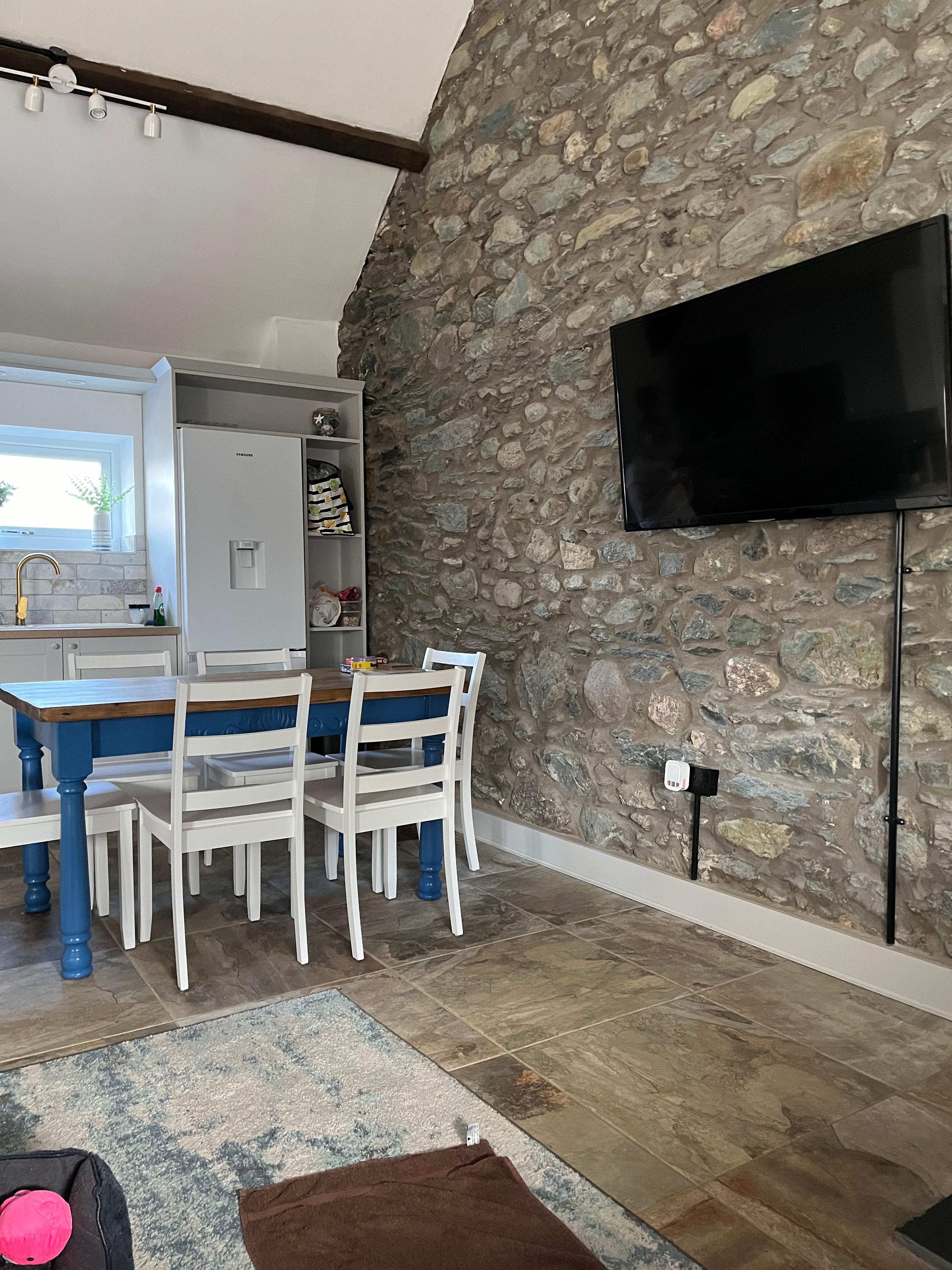 Well equipped kitchen and dining area