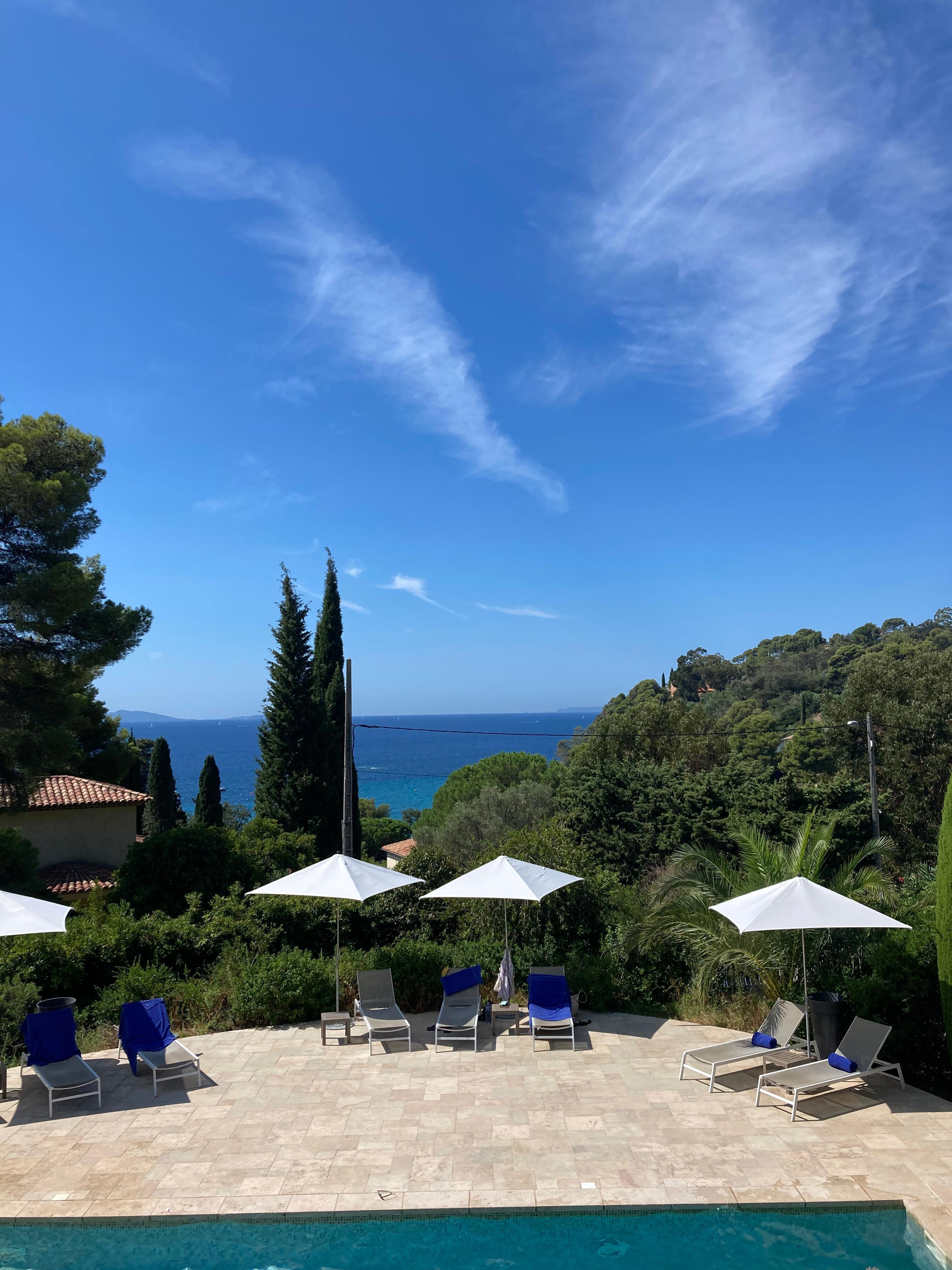 The view over the pool down to the sea