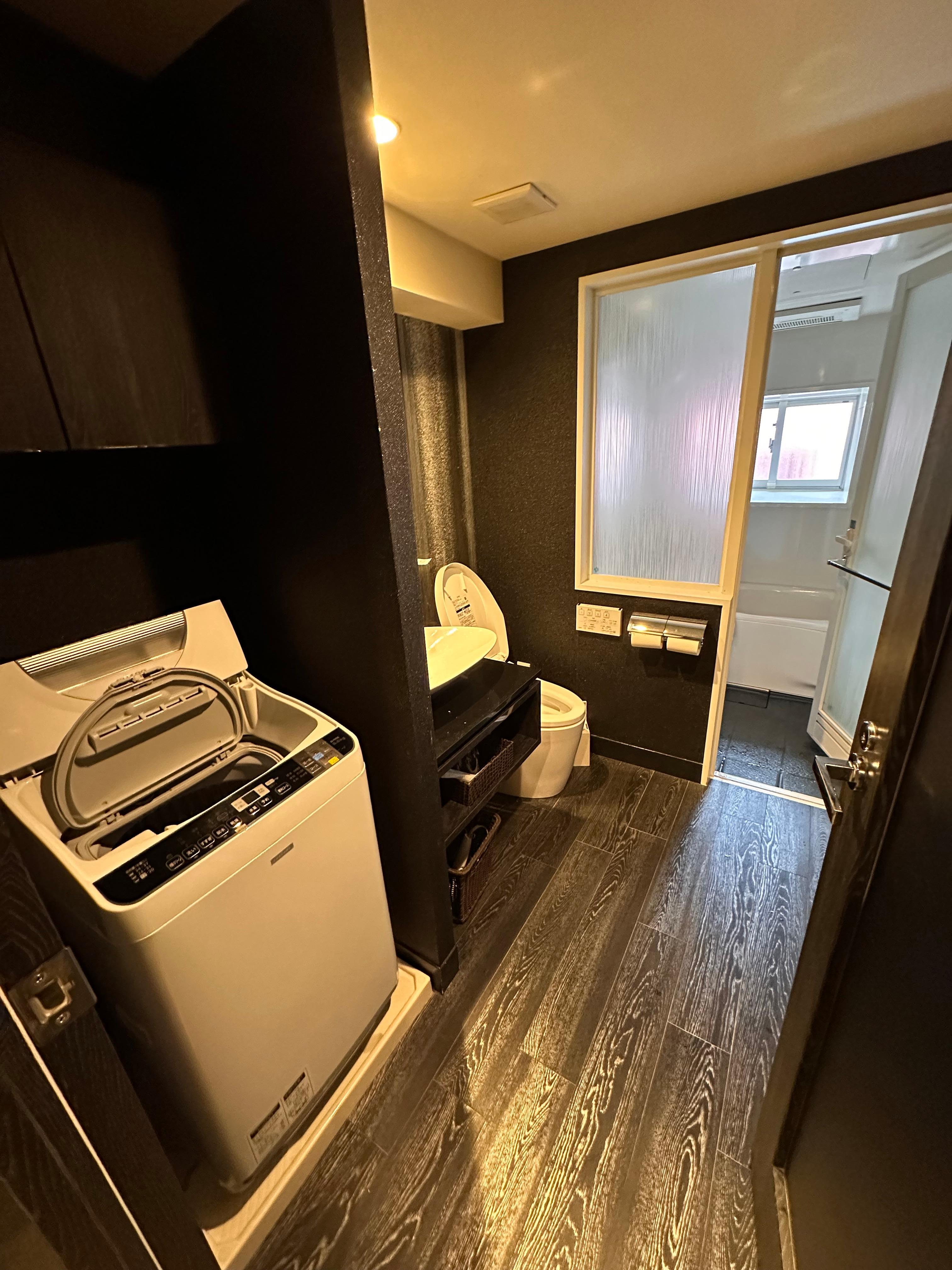 Bathroom with washer/dryer.  Water pressure was great and water was hot