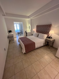Spacious bedroom and comfortable bed and pillows