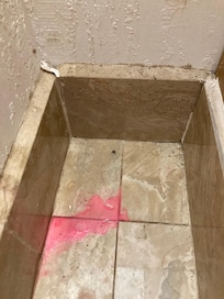 Dirt next to the sink
