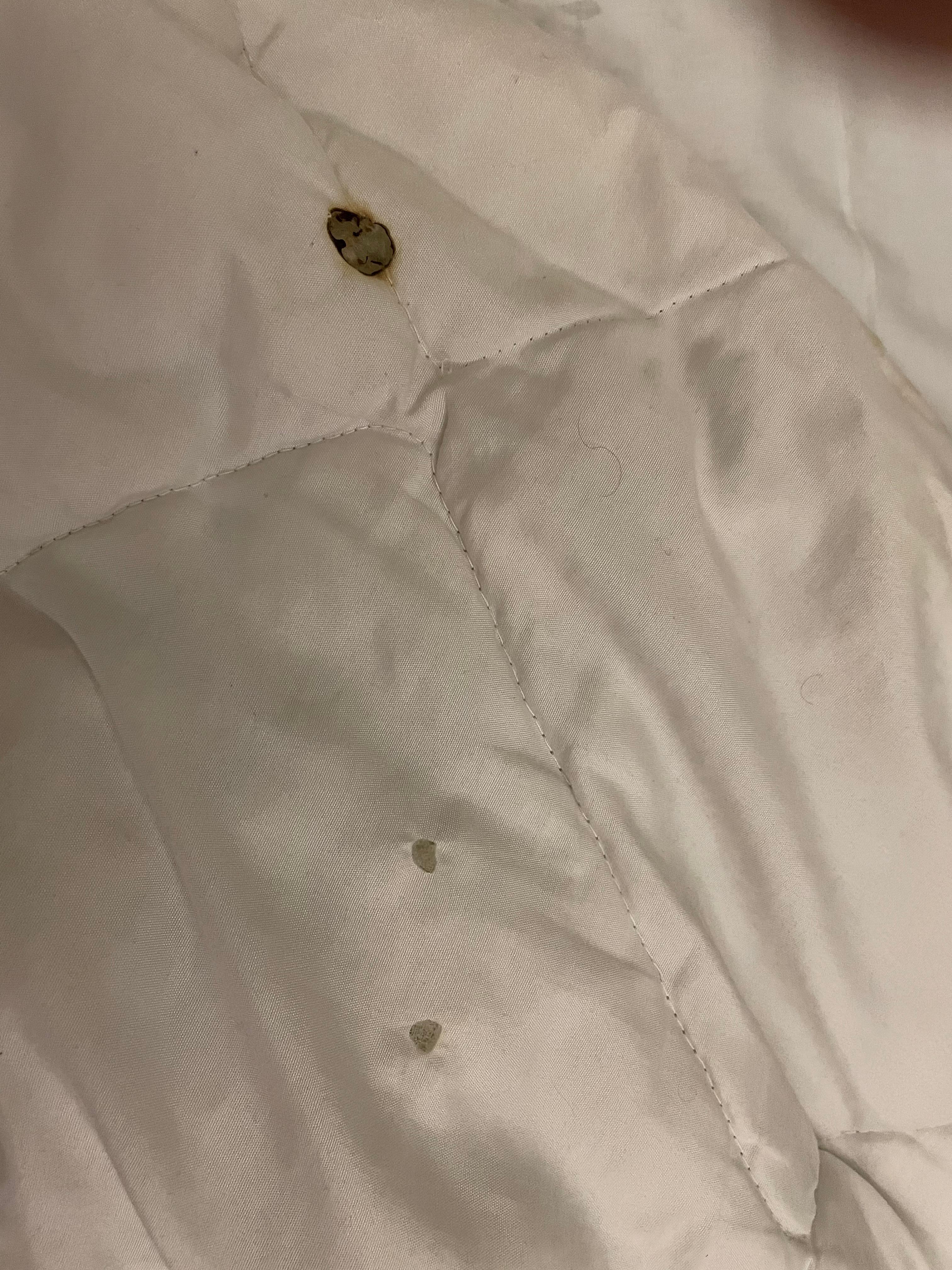 Bed sheets, very dirty, not white, holes of smoking and smells very bad