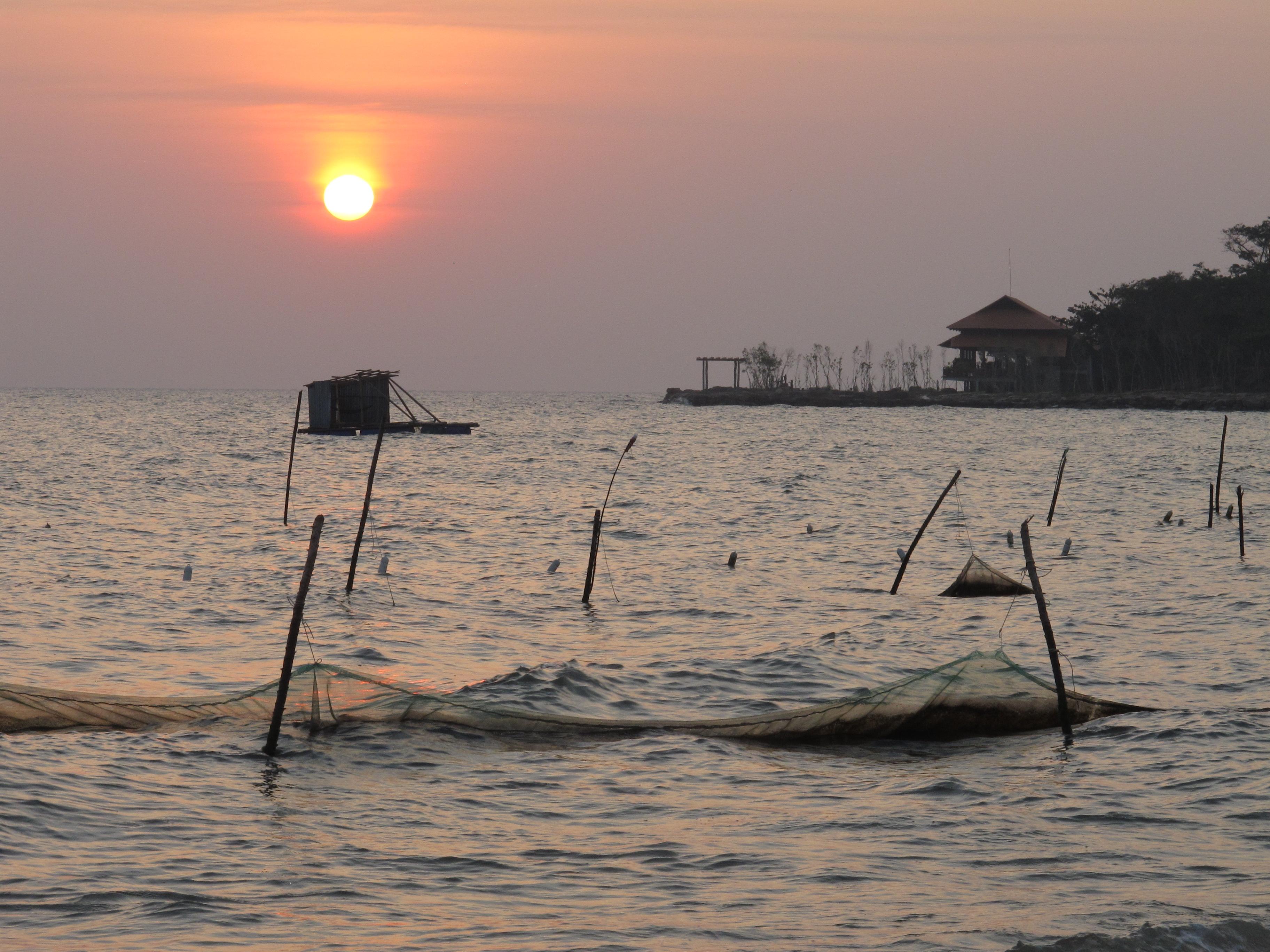 view from just along the beach where a couple of local fisherman have their nets