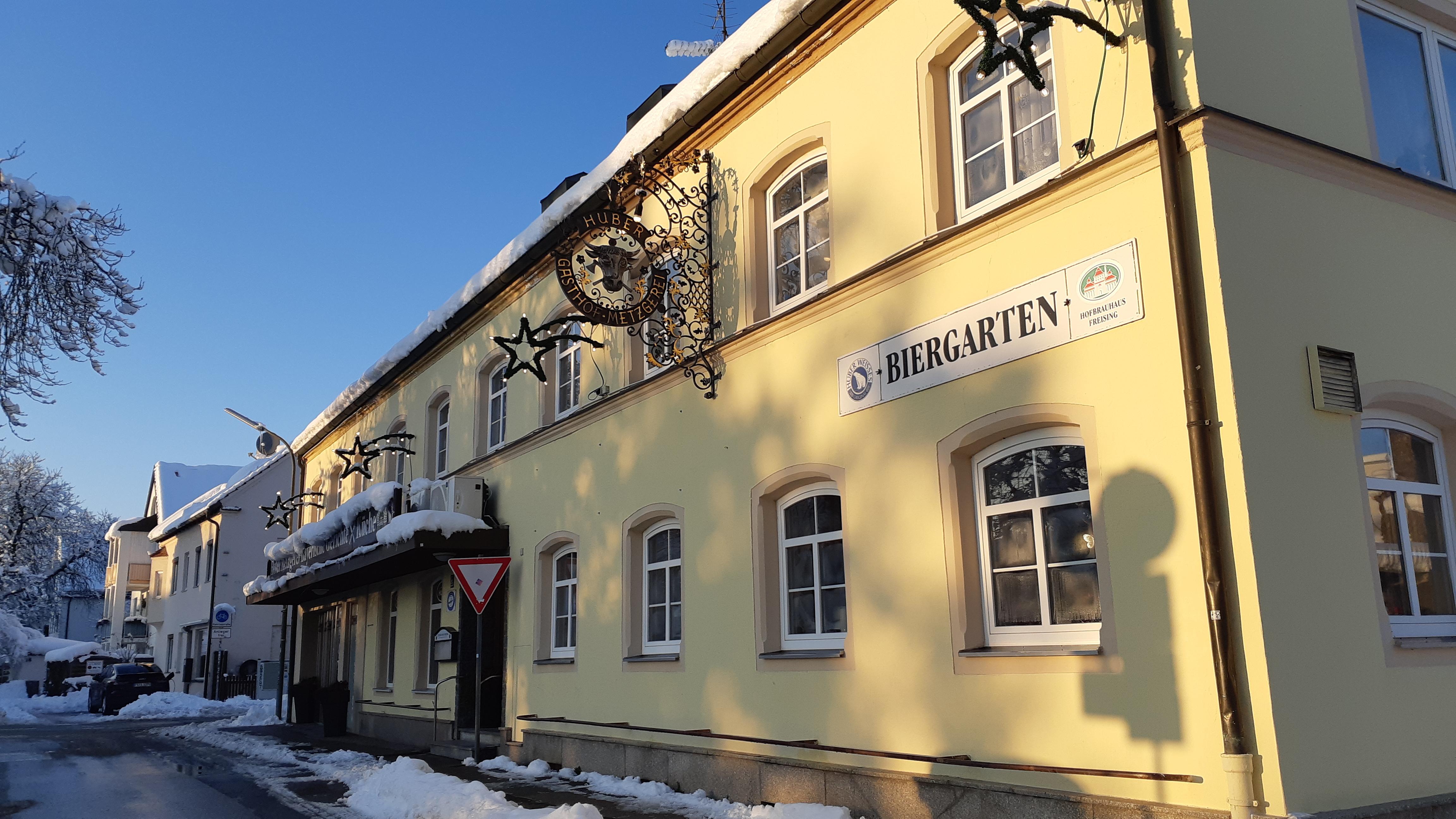 Butcher shop, restaurant and banquet hall (guest rooms behind)