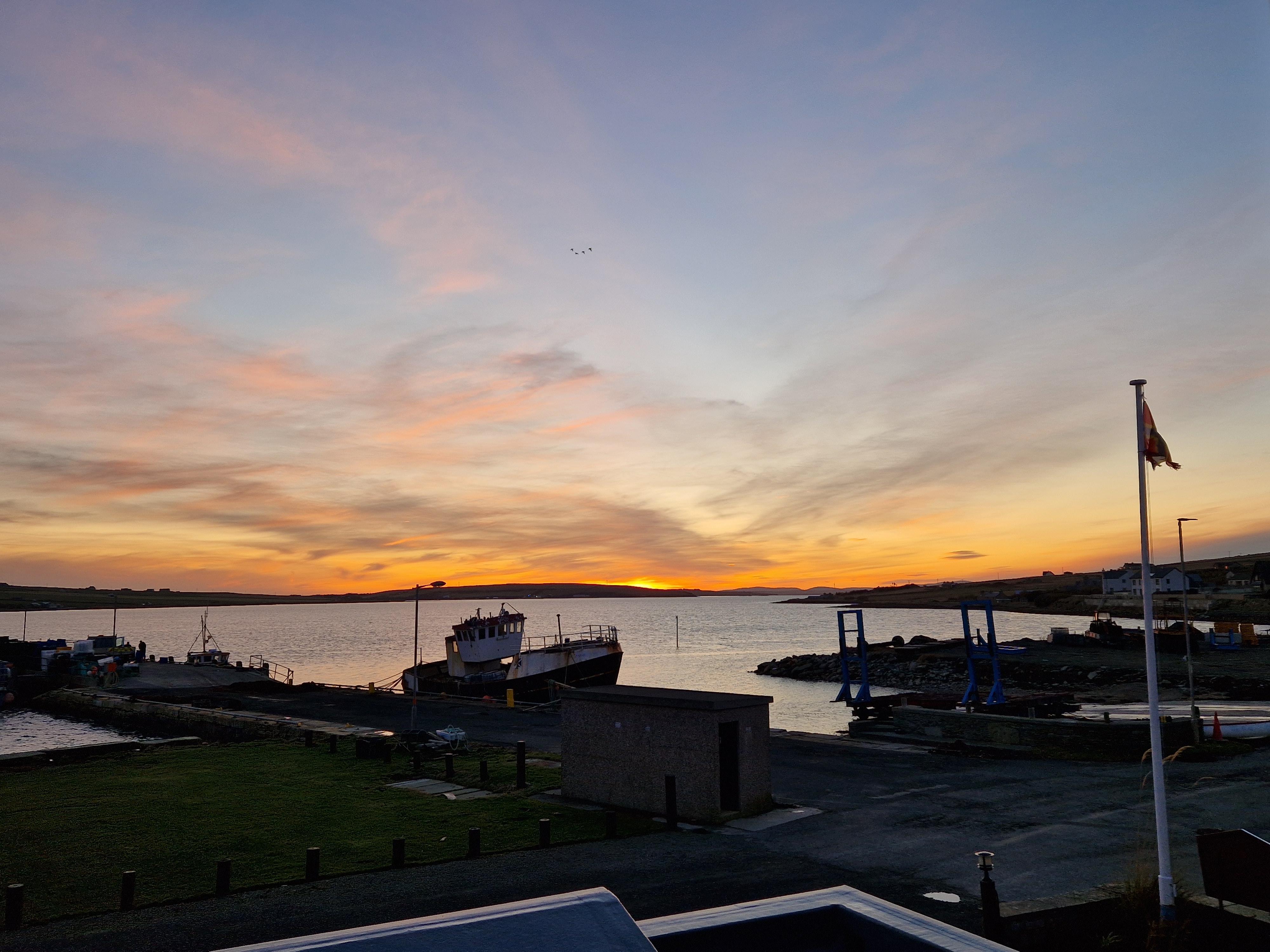 View from bedroom window at sunset.