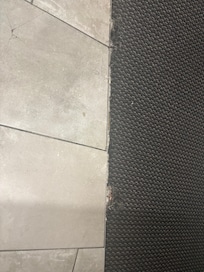 Carpet pulling from floor
