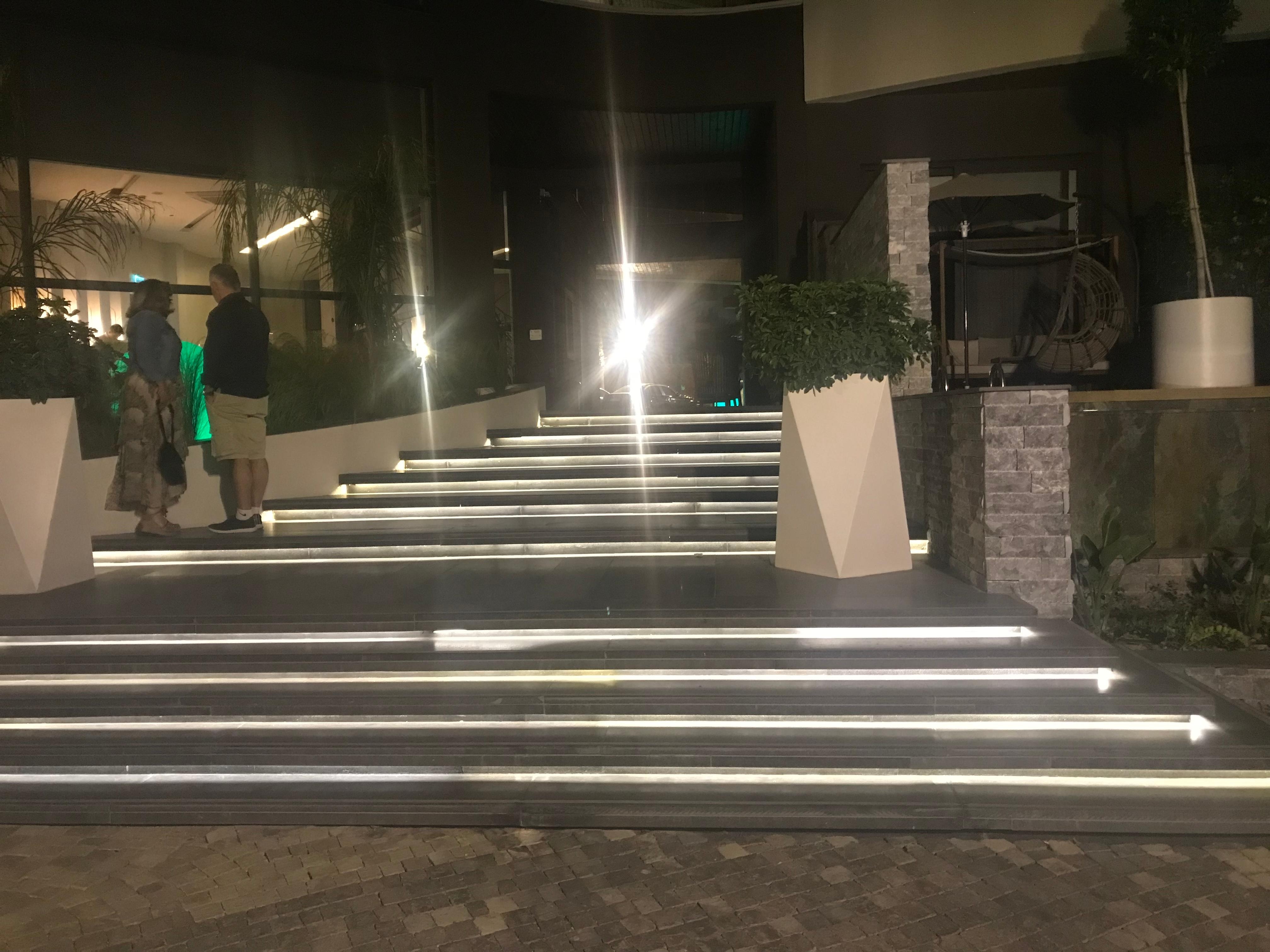 Steps to reception from the pool/garden area.