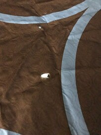 Cigarette burn holes bead spread