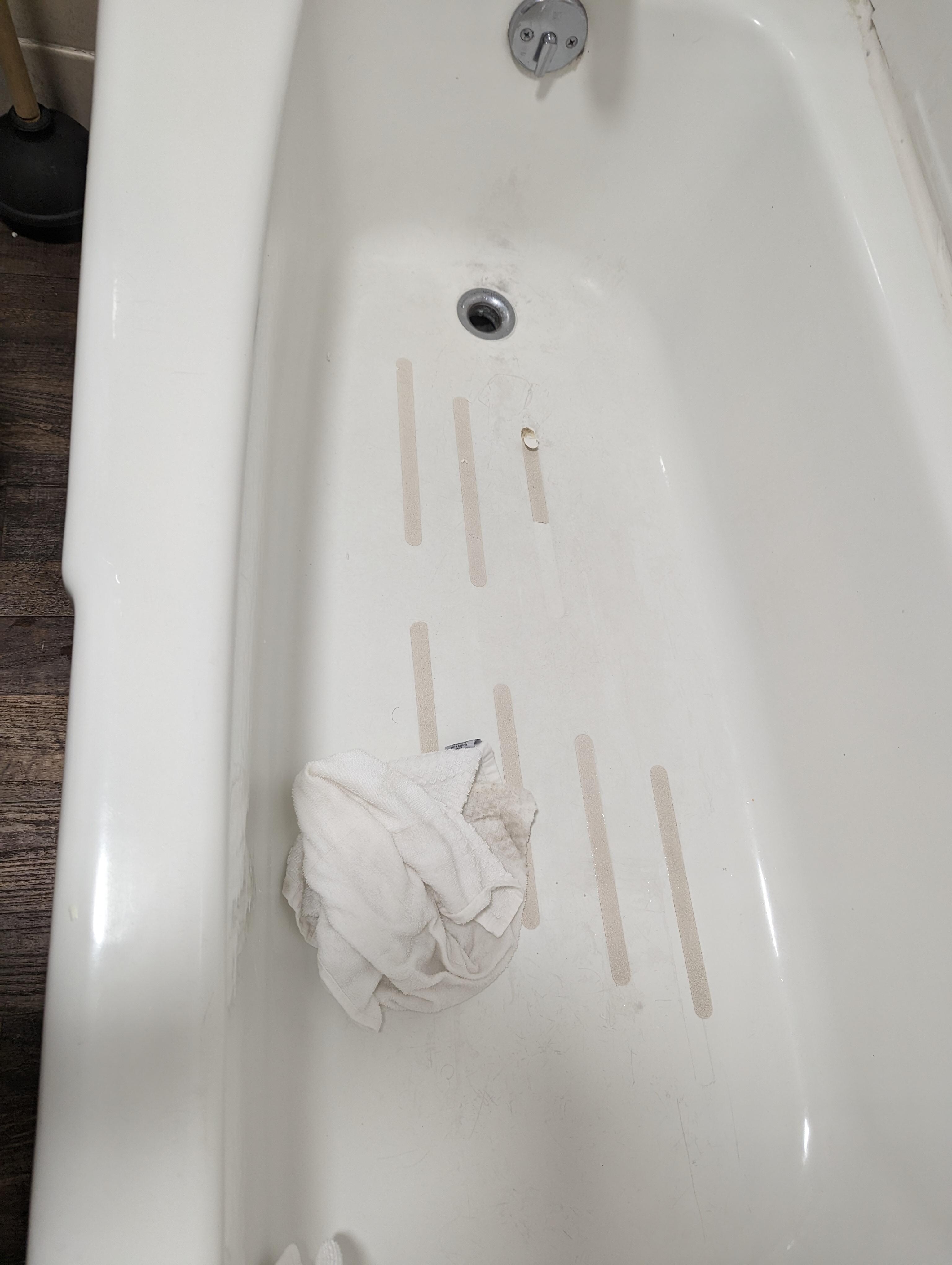 Dirty towels in tub
